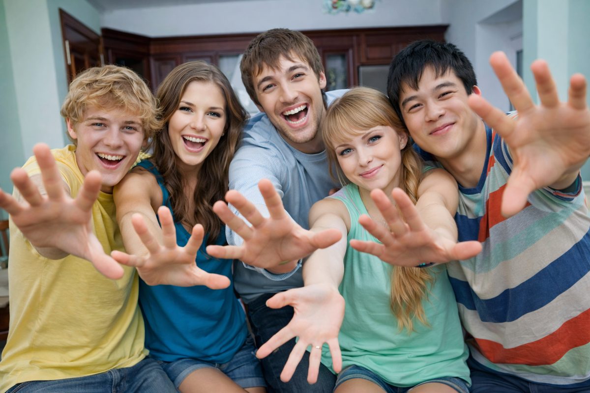 Group of cheerful young adults together